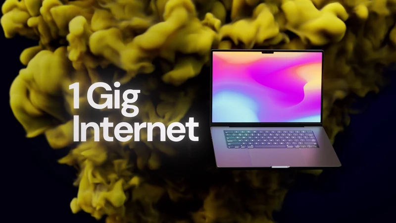 Laptop with a colorful screen beside 1 Gig Internet text and yellow smoke